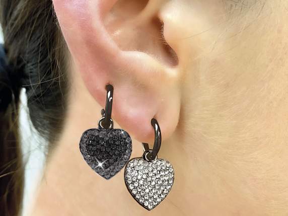 Pair of Cuore Stella metal earrings in test tube and displ
