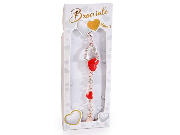Metal bracelet with lacquered hearts and rhinestones in card