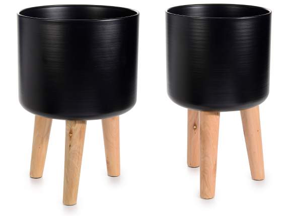 Set of 2 black metal vases on wooden tripod