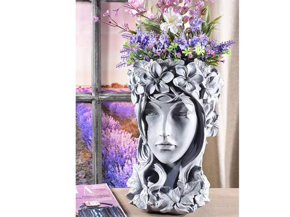 Resin vase Womans face w - embossed floral decorations