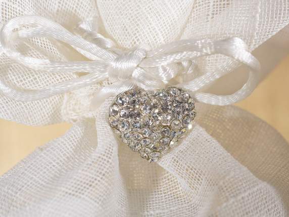 White organdie sachet with string and jewel heart