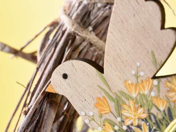 Wooden Easter animal with deco flowers and bow on stick