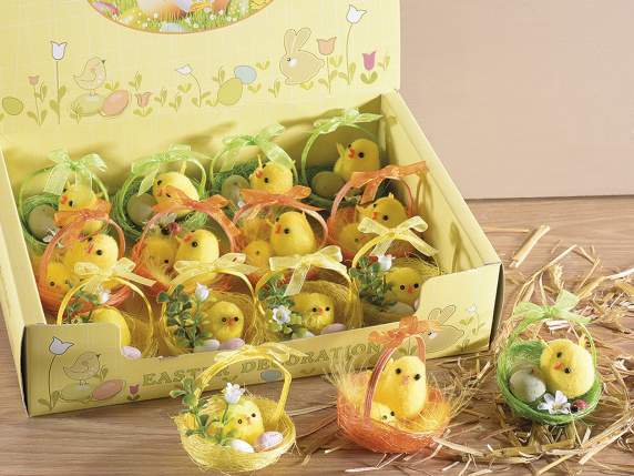 Display with 12 chicks in colorful basket with eggs
