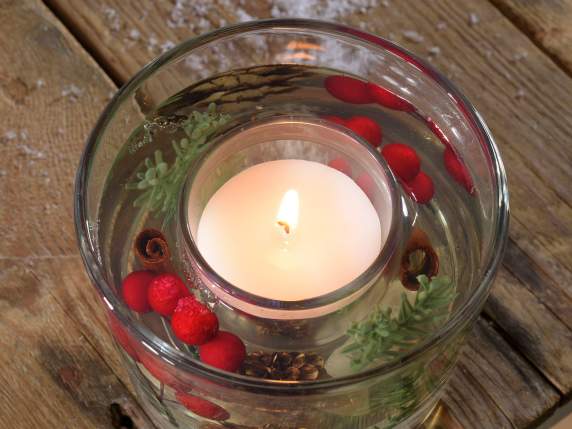 Scented gel candle in a glass jar with decorations