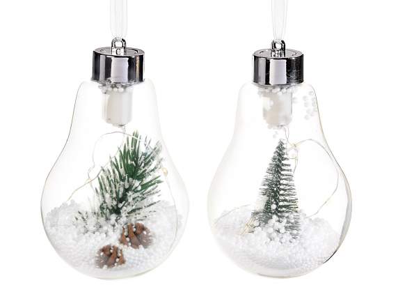 Glass bulb with snow, pine and LED lights to hang on display