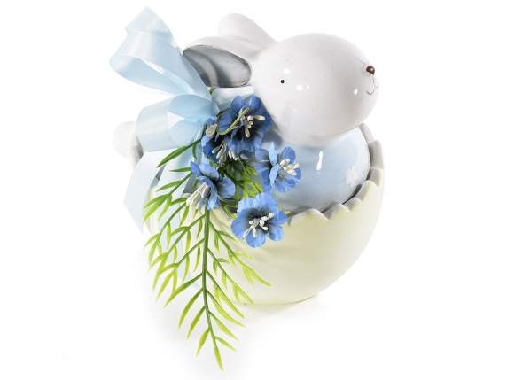 Bouquet of small fabric flowers and artificial leaves