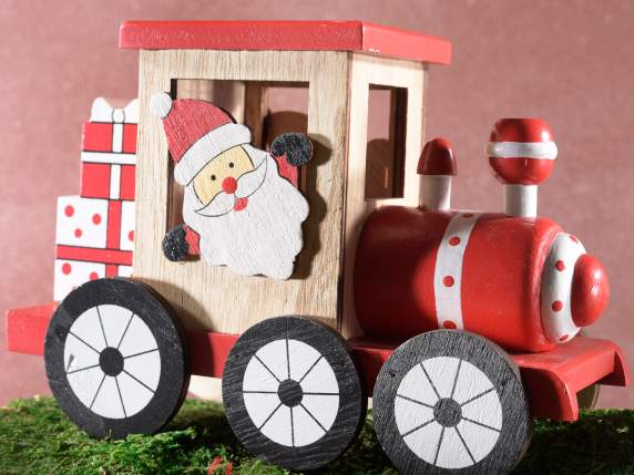 Colored wooden train with Christmas character