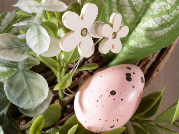 Wooden wreath with colored eggs to hang