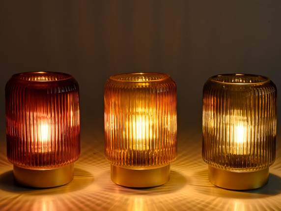 Lamp in knurled colored glass with golden base and LED light