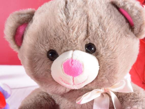 Teddy bear with pink heart I love you and bow