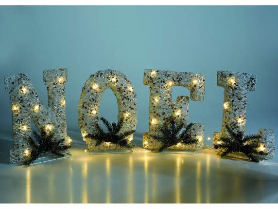 NOEL writing in white rattan with led lights and decorative