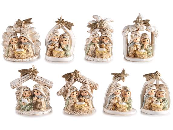 Nativity scene in colored resin with golden comet star