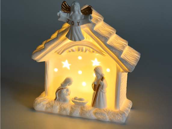 White ceramic crib w-glitter, led lights and golden decorati