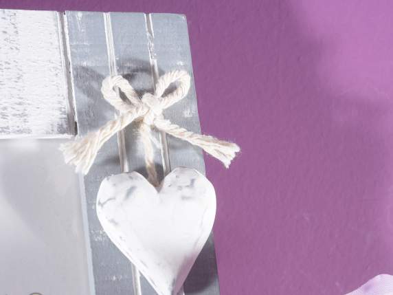 Wooden photo frame with heart pendant to be placed on