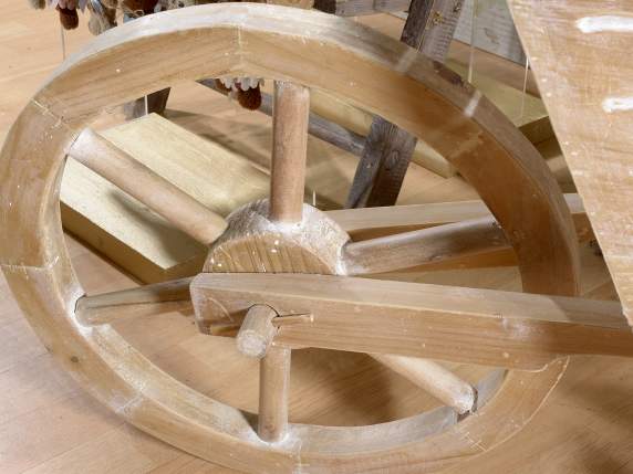 Life-size decorative wooden wheelbarrow