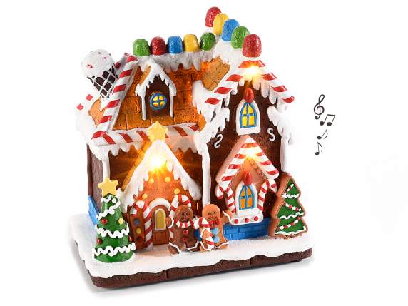 Maison en pain dépices en résine colorée avec lumières