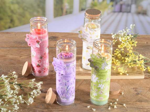 Bougie parfumée avec fleur en relief dans un pot en verre
