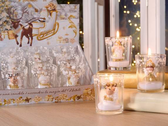 Bougie dans un pot en verre décoré dun personnage de Noël