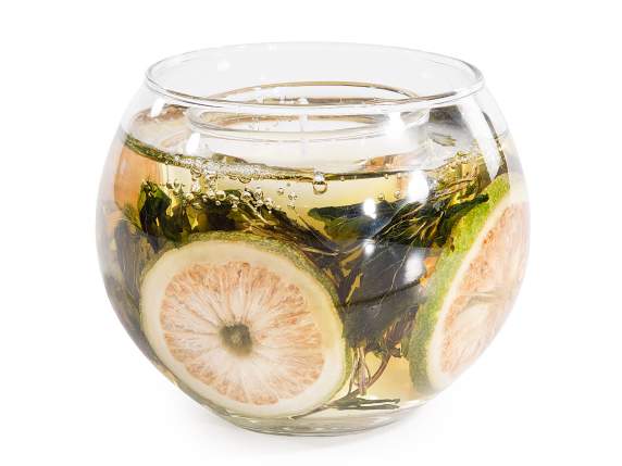 Bougie parfumée dans un pot en verre avec gel et décorations