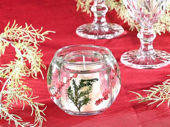 Bougie parfumée dans un pot en verre avec gel et décorations
