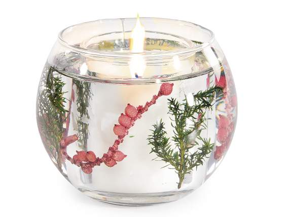 Bougie parfumée dans un pot en verre avec gel et décorations