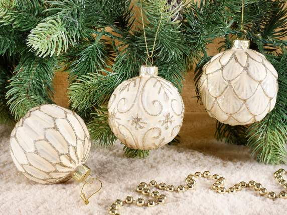 Boule en verre colorée avec décorations dorées à suspendre
