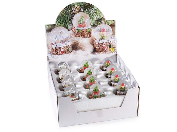 Boule à neige thème Noël sur panier en résine