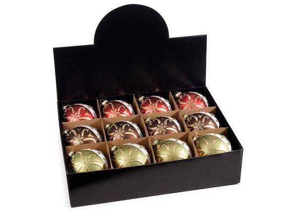 Boule de verre avec décorations suspendues