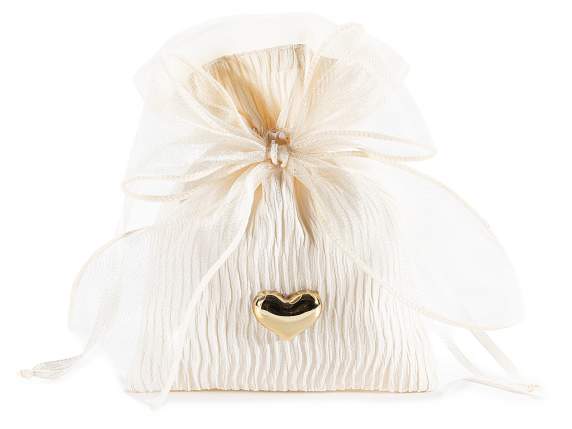 Sac en tissu orné dun cœur et dun nœud en métal doré