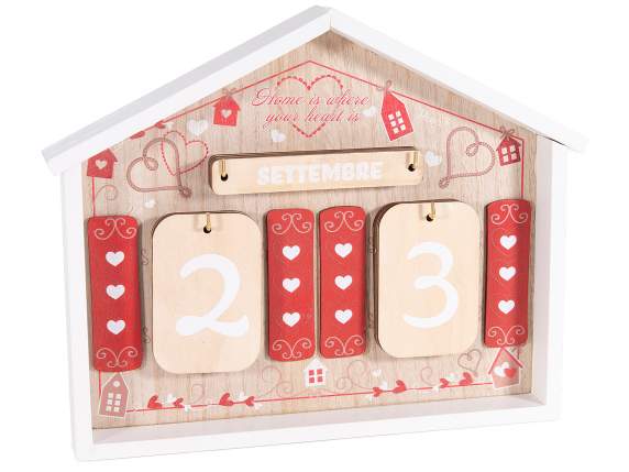 Calendrier perpétuel en bois avec décorations familiales