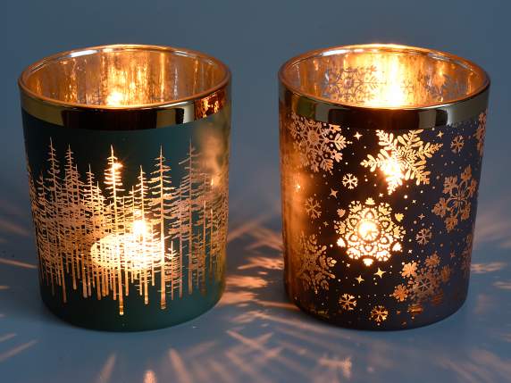 Glass candle holder with shiny gold-like details and decorat
