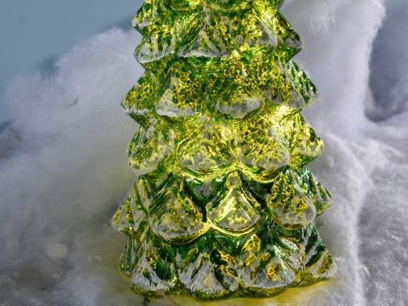 Transparent glass tree covered with snow to be placed with L