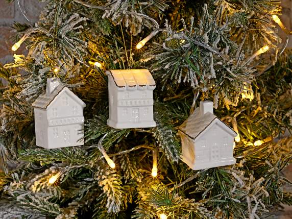 Maison en porcelaine avec détails dorés à suspendre
