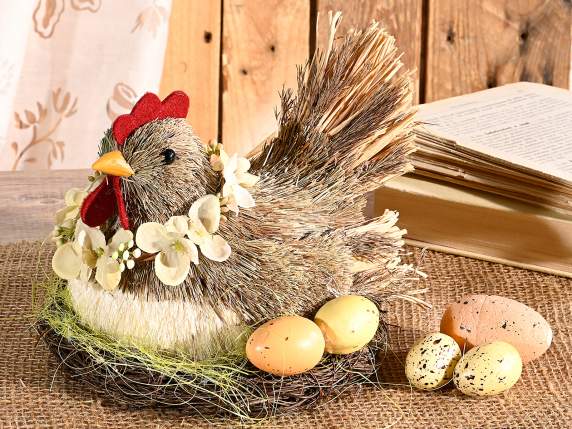 Poule dans un nid en fibre naturelle avec des œufs