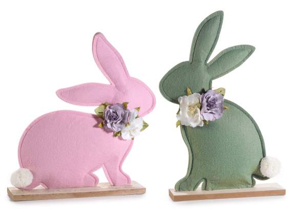 Padded cloth bunny with flowers on a wooden base