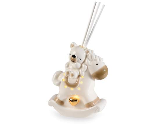 Ours en porcelaine sur cheval à bascule, bâtons lumineux pou