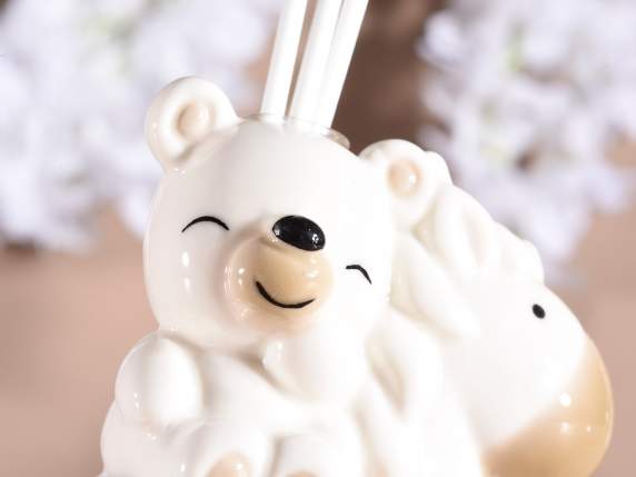 Ours en porcelaine sur cheval à bascule, bâtons lumineux pou