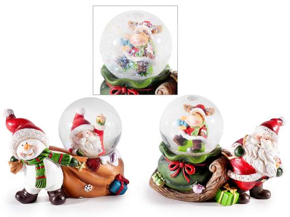 Boule de neige sur sac cadeau en résine avec des personnages