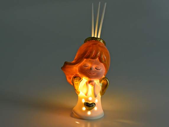 Angelo porcellana con luce e stick per profumare