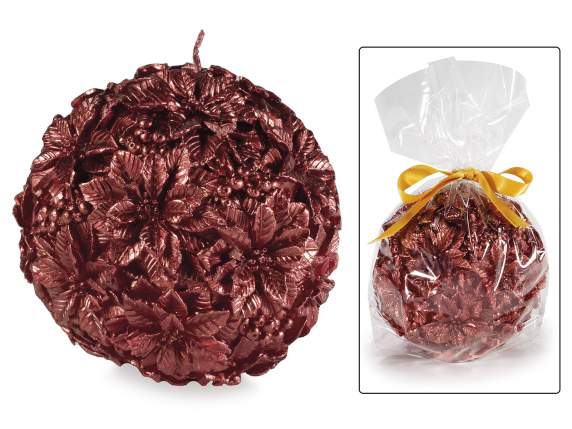 Bougie boule rouge avec décorations florales de Noël