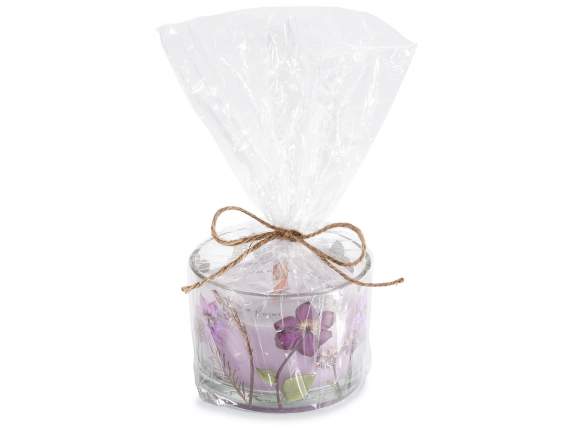 Bougie parfumée dans un pot en verre décoré de fleurs