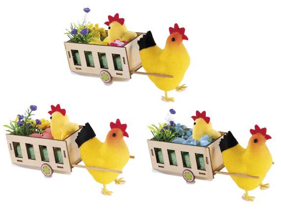Poule floquée avec poussin et œufs dans un chariot en bois