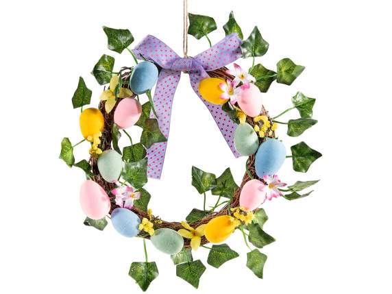 Guirlande en bois avec oeufs, lierre, fleurs et noeud à susp