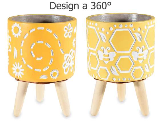 Cement vase on wooden tripod with Bee Honey decorations