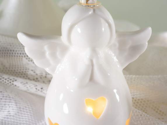 Angioletto in porcellana con luci LED e stick per profumare