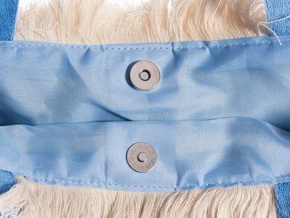 Borsa in tessuto con manici e frange e con scritta ricamata