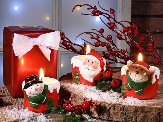 Candela in vasetto di ceramica con personaggio natalizio