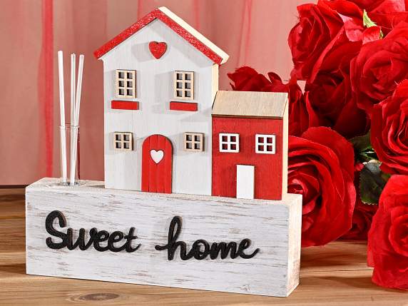 Casetta in legno con provetta vetro e stick per profumare