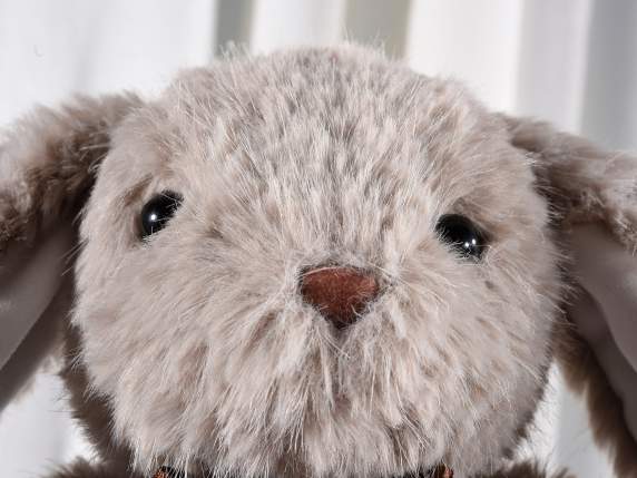 Coniglietto in morbido peluche con fiocco ed orecchie lunghe