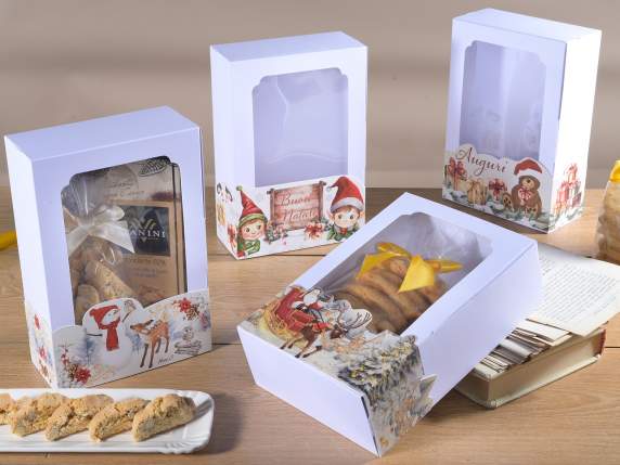 Caja de papel blanca con ventana y tarjeta navideña.